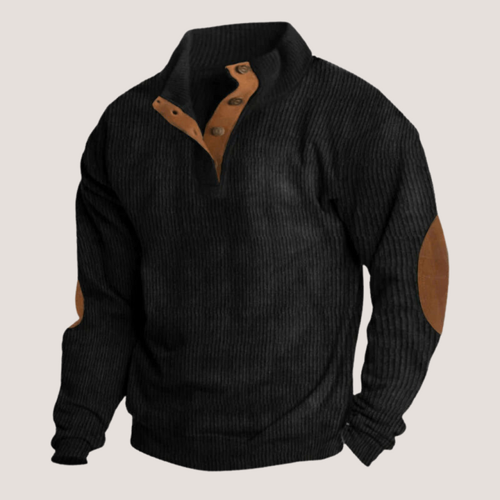 Pull homme gris à col montant et coudières, parfait pour un look automnal élégant et décontracté.