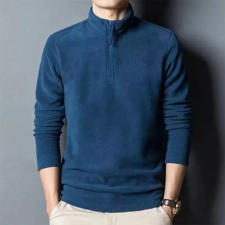 Haut thermique homme chaud et douillet, pull demi-zip idéal pour affronter l'hiver avec confort.