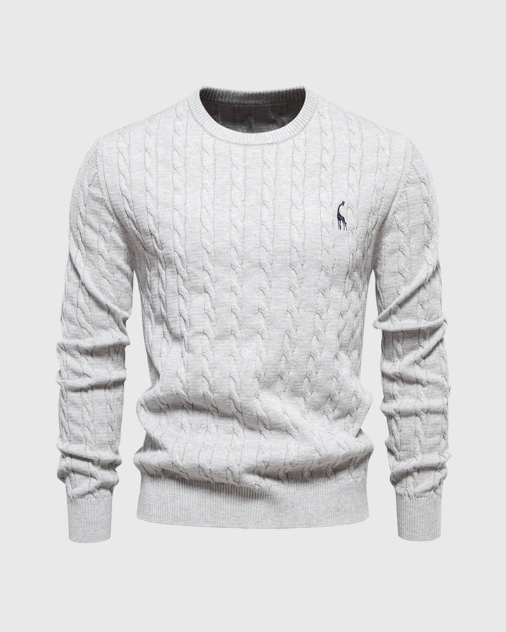 Pull homme à torsades apparentes, allie confort et modernité élégante.