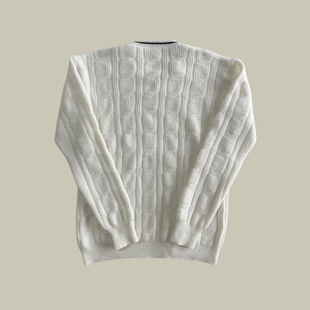Pull homme tricoté italien, luxe et confort.  Modèle élégant et doux, parfait pour toutes occasions.