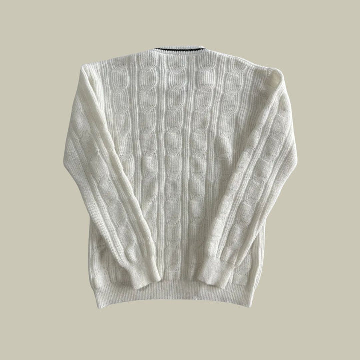 Pull homme tricoté italien, luxe et confort.  Modèle élégant et doux, parfait pour toutes occasions.