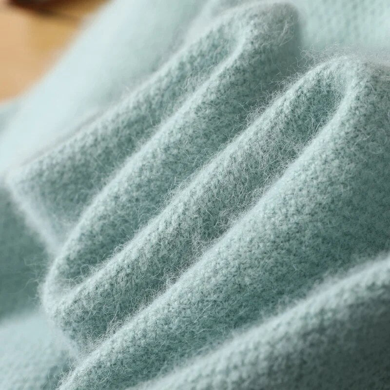 Pull femme confortable et doux, maille fine, style intemporel, idéal pour l'hiver et l'automne.