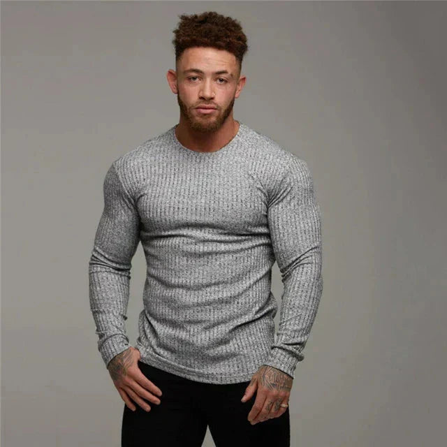 Pull homme en maille fine, confort moderne et style élégant. Parfait pour un look décontracté intemporel.