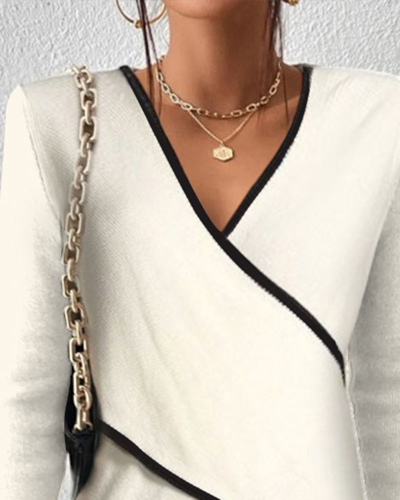 Pull Naya à col V pour femme, idéal pour un confort chic et polyvalent. Maille fine intemporelle.