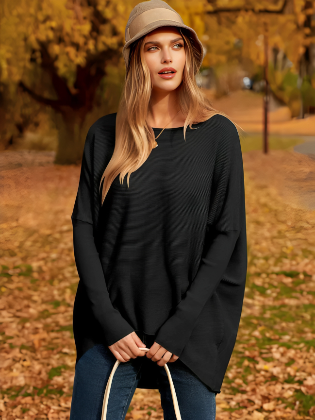 Pull femme oversize polyvalent, élégant et confortable. Idéal pour la saison automne-hiver.
