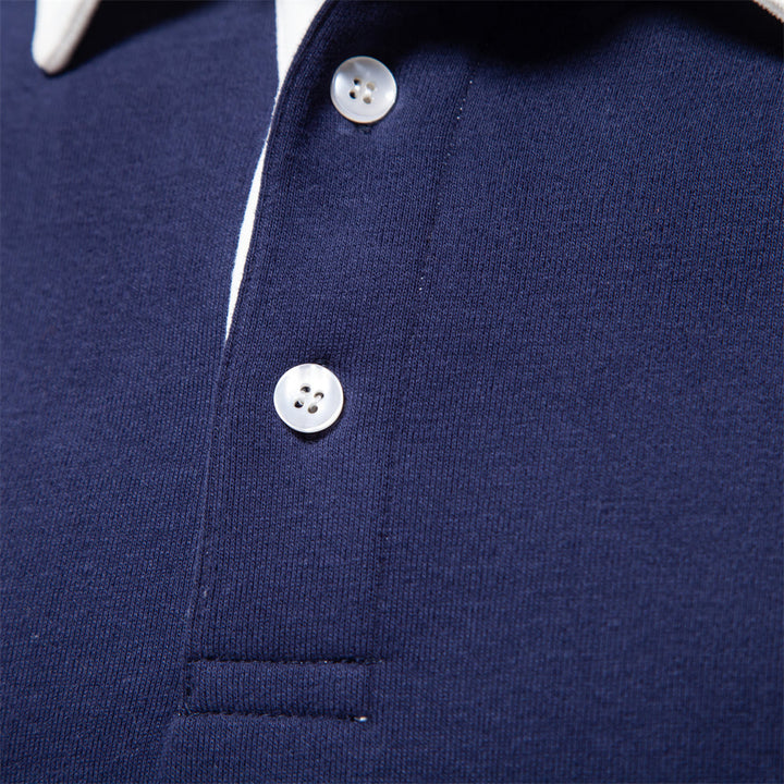 Polo homme noir intemporel. Sweat élégant à manches longues avec col classique pour un confort moderne.