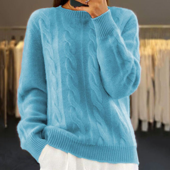 Pull torsadé élégant femme, doux, confortable. Idéal pour automne/hiver.