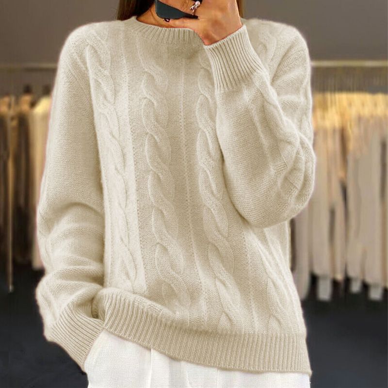 Confortable pull torsadé femme, douceur optimale. Un essentiel élégant pour l'hiver et l'automne.