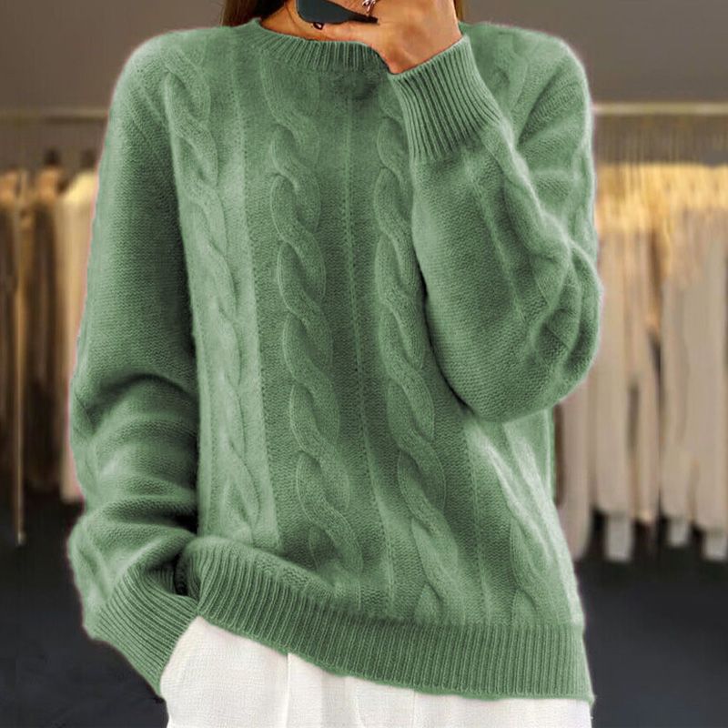 Pull torsadé femme, doux et élégant. Confortable tricot à manches longues, parfait pour les journées d'hiver.