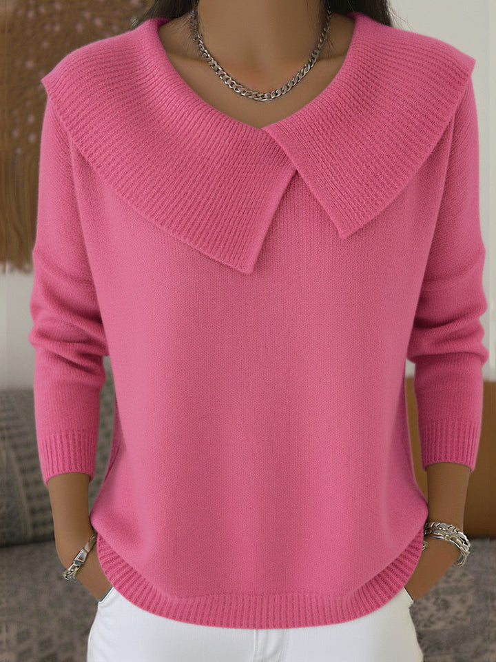 Pull femme rose tricoté à col côtelé. Manches longues élégantes pour un look hiver-automne décontracté.