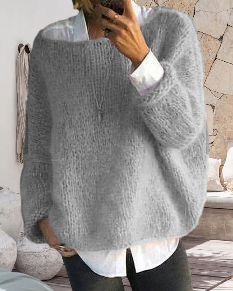 Pull femme rose, tricoté chic, coupe moderne à épaules dénudées, tendance.