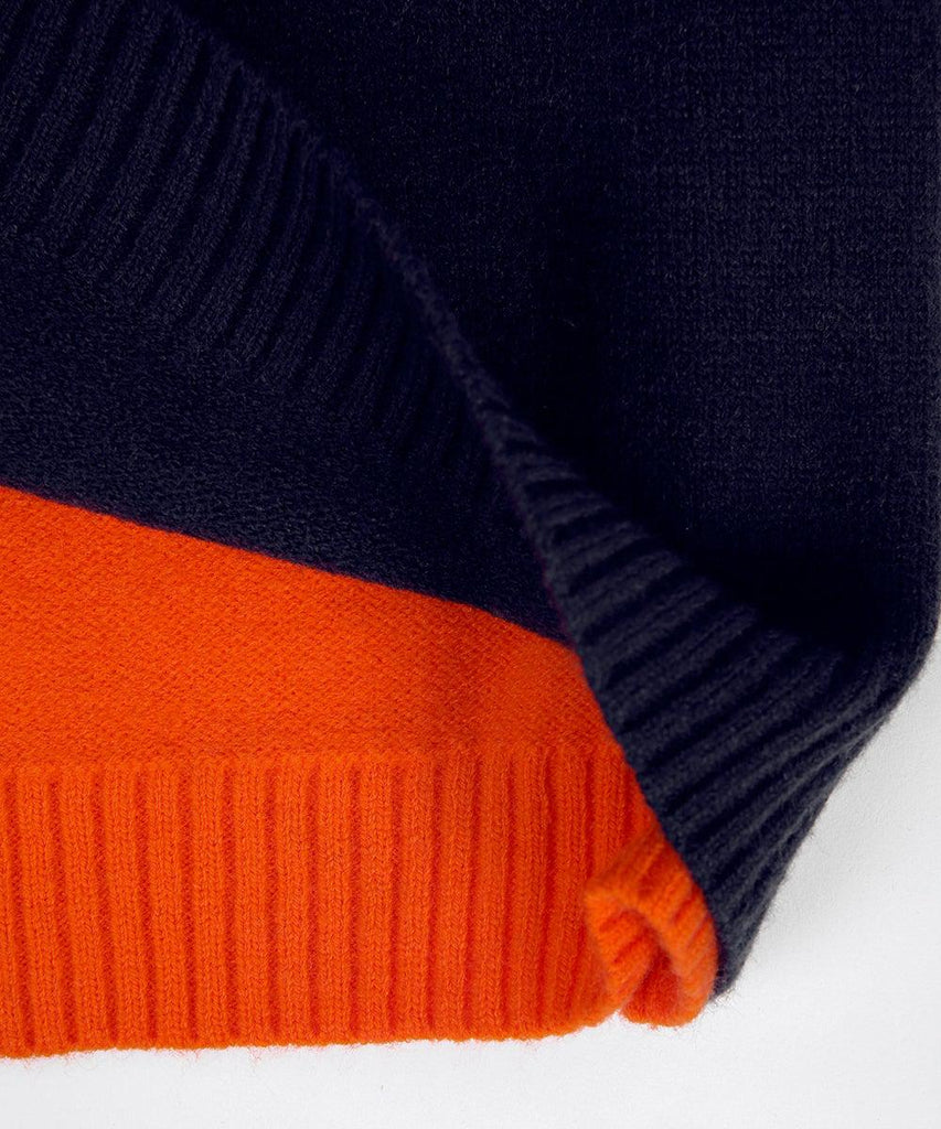 "Pull Véronique marine et orange à rayures rétro, coton doux pour femmes, look chic et confortable."