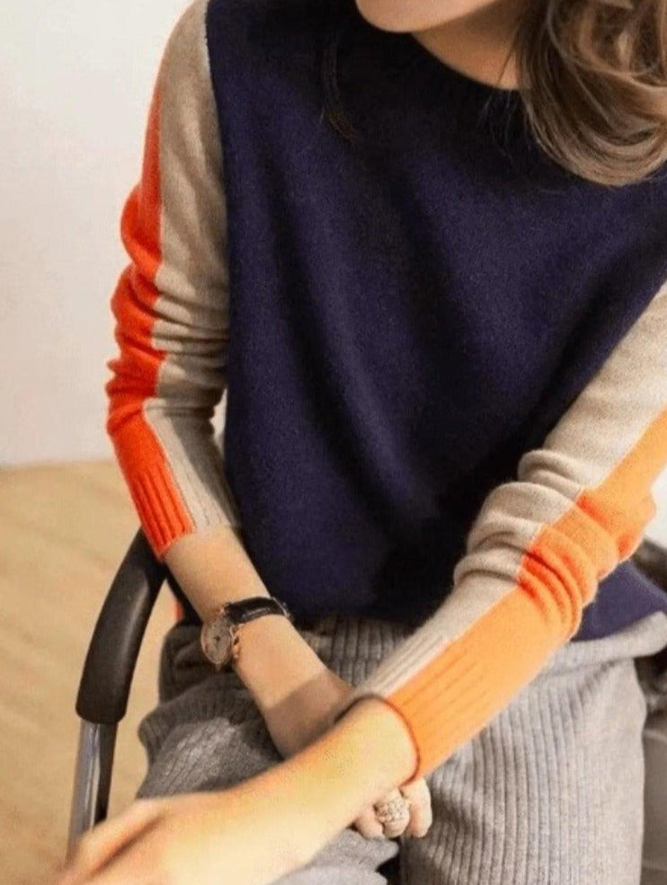 "Pull Véronique marine et orange à rayures rétro, coton doux pour femmes, look chic et confortable."