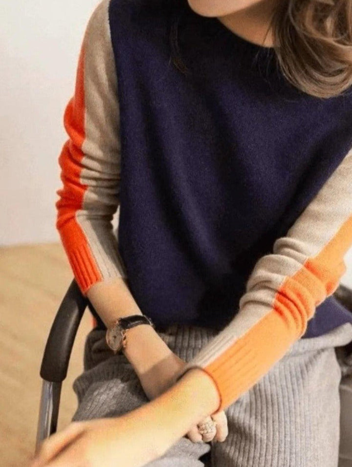 "Pull Véronique marine et orange à rayures rétro, coton doux pour femmes, look chic et confortable."