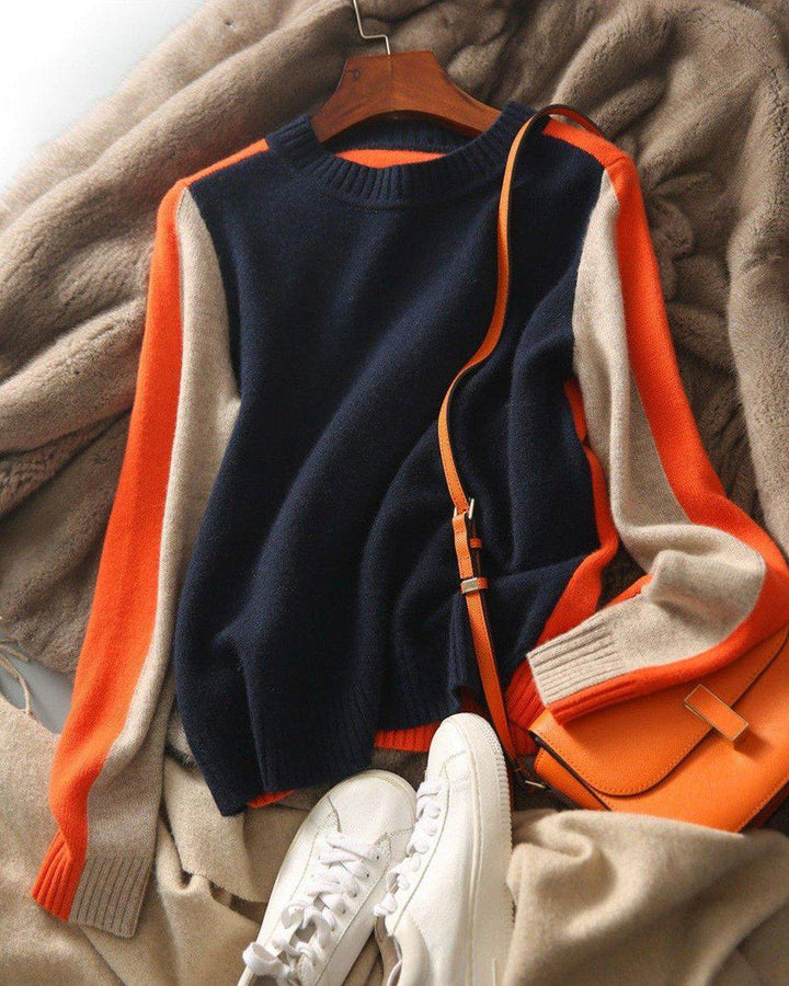 "Pull Véronique marine et orange à rayures rétro, coton doux pour femmes, look chic et confortable."