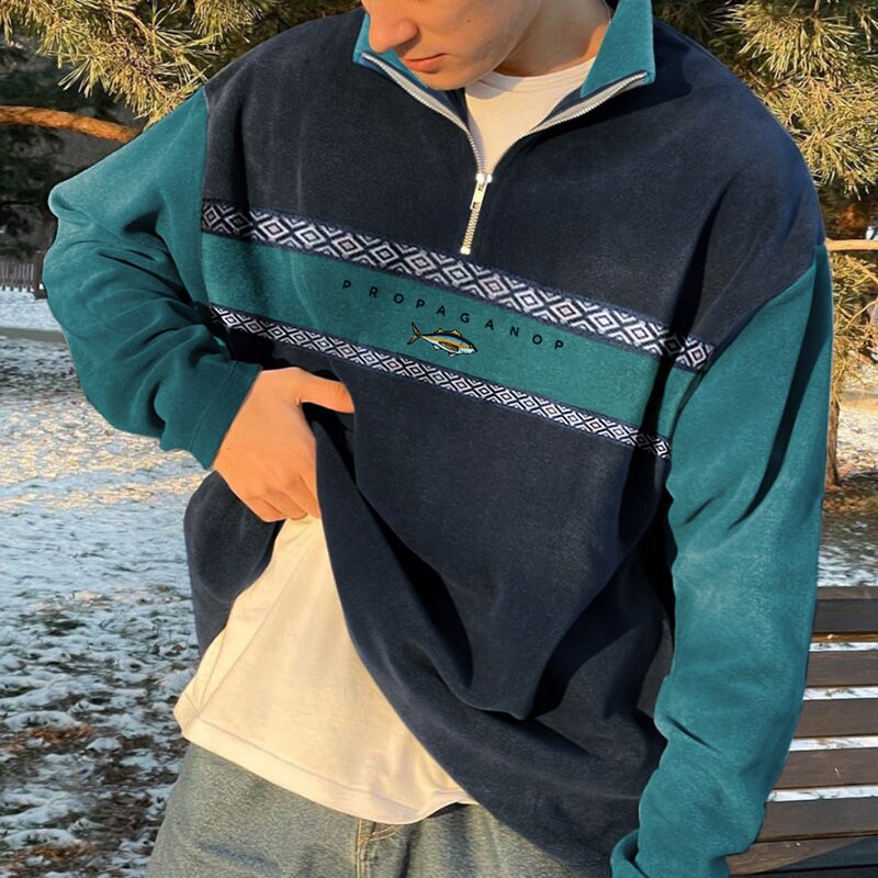Pull homme zippé style rétro, coupe élégante pour confort automne-hiver. Vêtement décontracté et tendance.