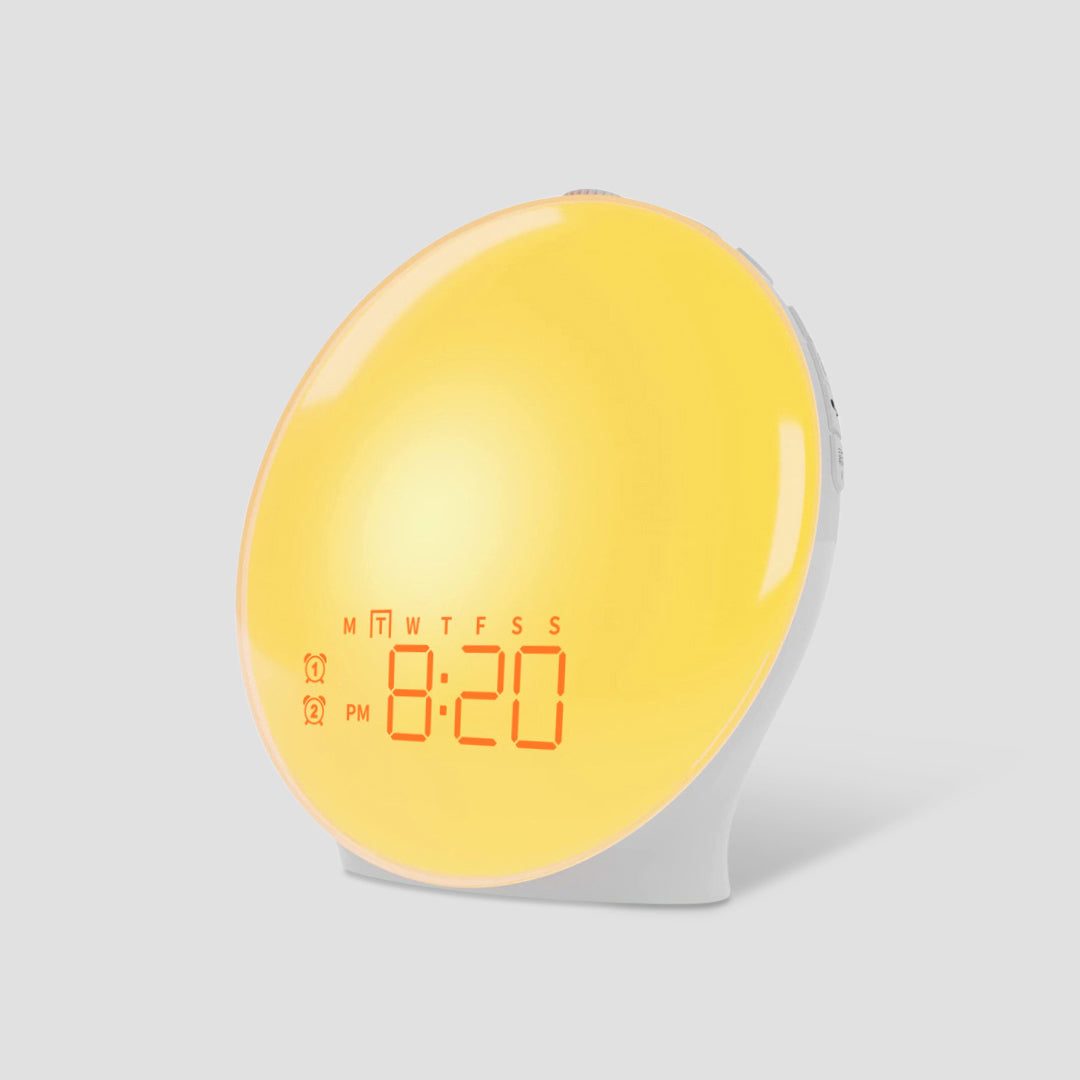 "Réveil simulateur soleil LumiRise éclairage doux réglable design épuré pour un réveil naturel et paisible dans la chambre"