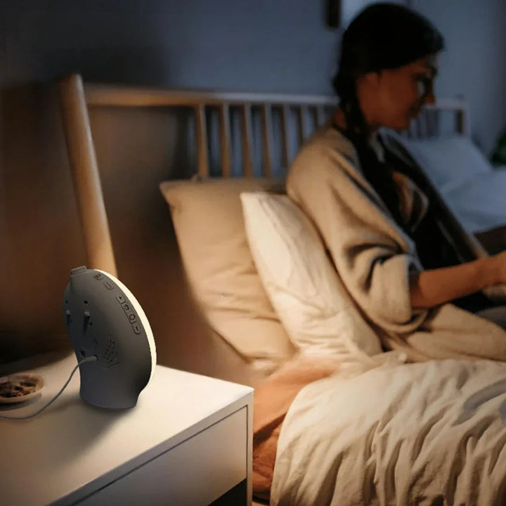 "Réveil simulateur soleil LumiRise éclairage doux réglable design épuré pour un réveil naturel et paisible dans la chambre"