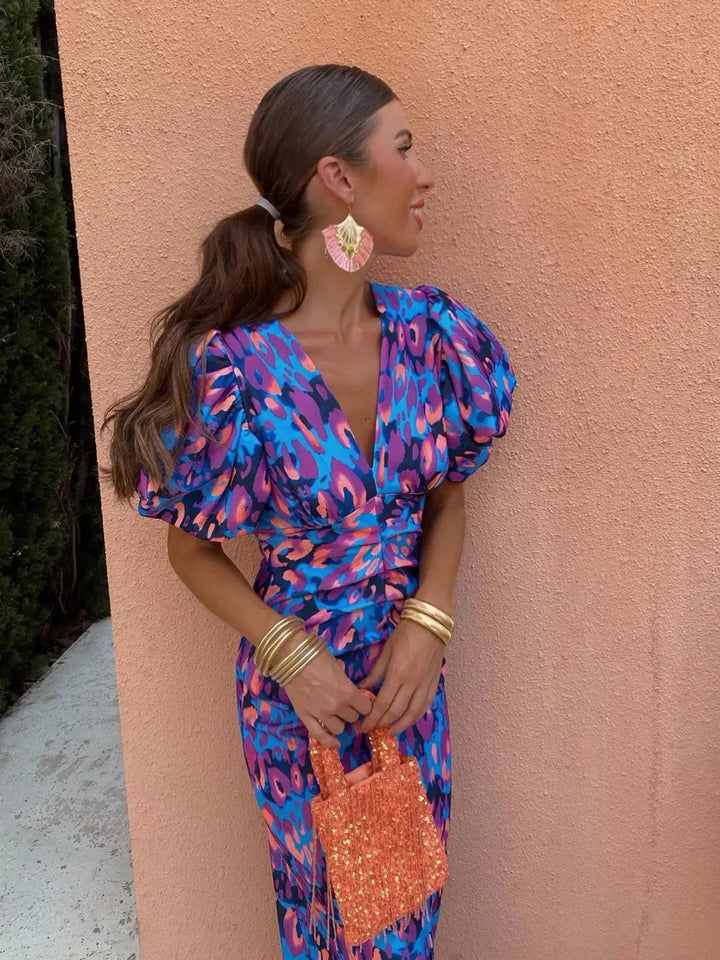 "Robe Alice féminine chic, manches bouffantes imprimées élégantes, silhouette flatteuse, style audacieux et raffiné."
