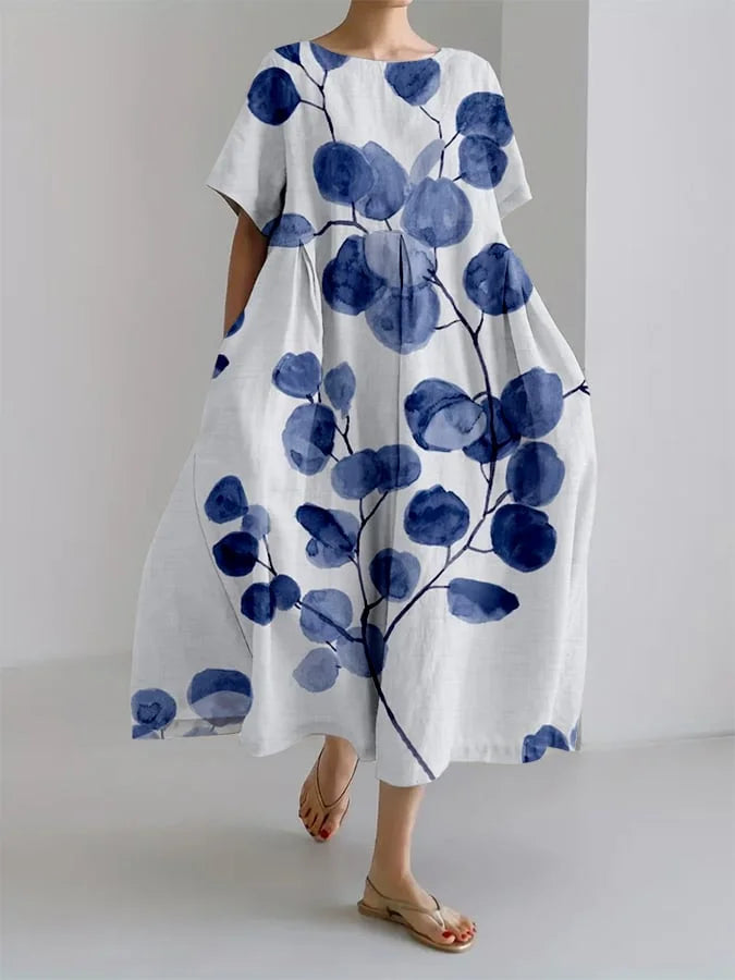 Robe ample, imprimé floral rétro, style vintage, coupe décontractée, manches courtes.