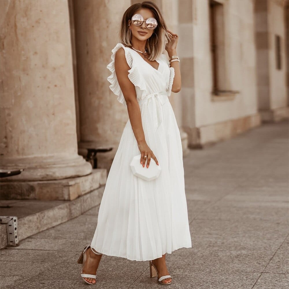 Robe bohème à volants, coupe fluide, volants sur épaules, style chic et élégant, parfaite pour occasions spéciales.