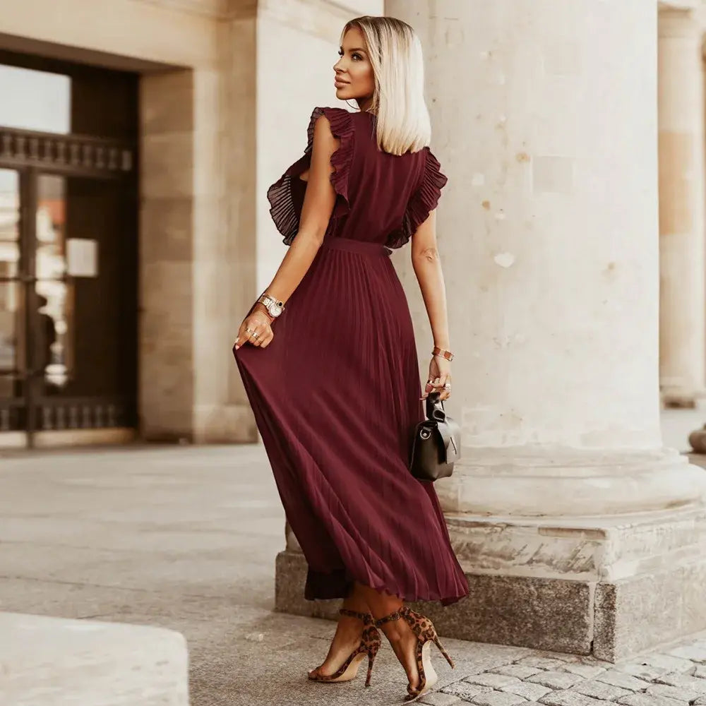 Robe bohème à volants, coupe fluide, volants sur épaules, style chic et élégant, parfaite pour occasions spéciales.