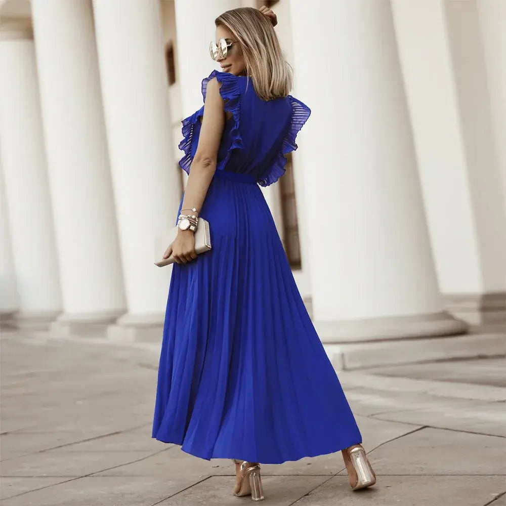Robe bohème à volants, coupe fluide, volants sur épaules, style chic et élégant, parfaite pour occasions spéciales.