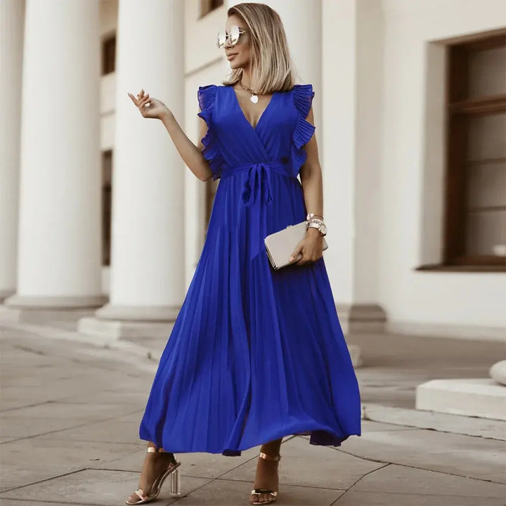 Robe bohème à volants, coupe fluide, volants sur épaules, style chic et élégant, parfaite pour occasions spéciales.