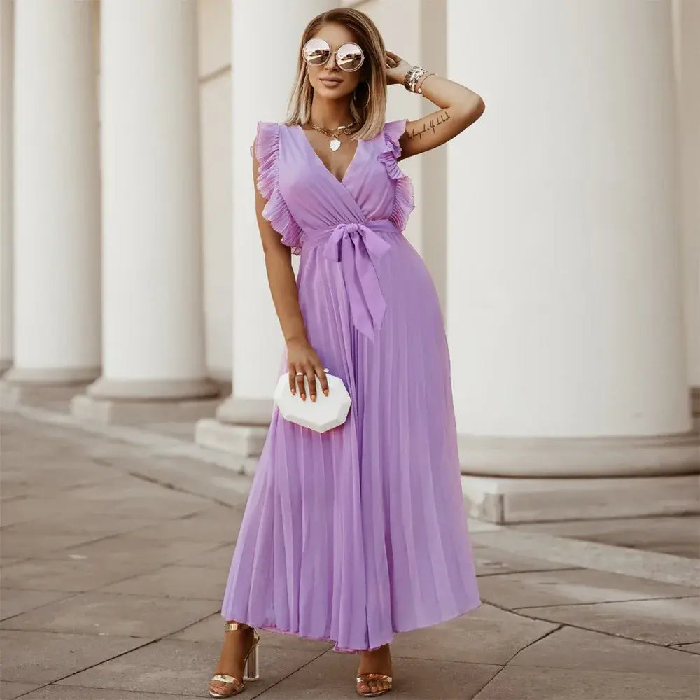 Robe bohème à volants, coupe fluide, volants sur épaules, style chic et élégant, parfaite pour occasions spéciales.