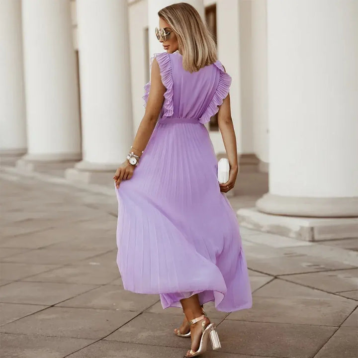 Robe bohème à volants, coupe fluide, volants sur épaules, style chic et élégant, parfaite pour occasions spéciales.