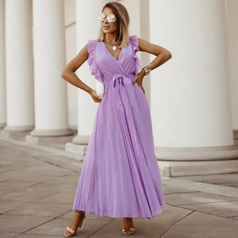 Robe bohème à volants, coupe fluide, volants sur épaules, style chic et élégant, parfaite pour occasions spéciales.
