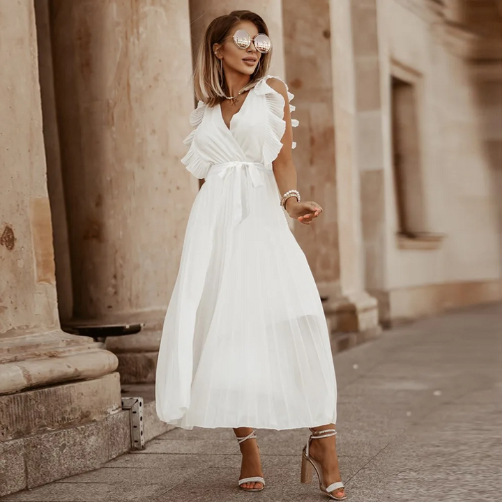 Robe bohème à volants, coupe fluide, volants sur épaules, style chic et élégant, parfaite pour occasions spéciales.