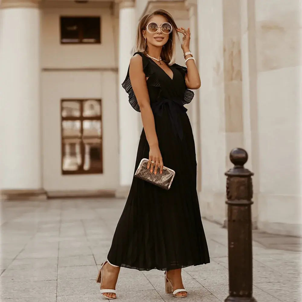 Robe bohème à volants, coupe fluide, volants sur épaules, style chic et élégant, parfaite pour occasions spéciales.