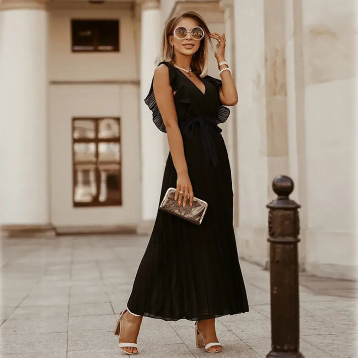 Robe bohème à volants, coupe fluide, volants sur épaules, style chic et élégant, parfaite pour occasions spéciales.