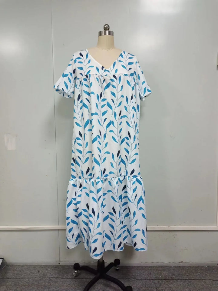 "Robe Boho d'été à col V, imprimé floral coloré, manches courtes, style fluide pour journées chaudes"