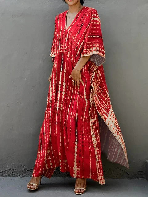 Robe maxi bohème bleue, caftan fluide femme chic, tenue de plage estivale.