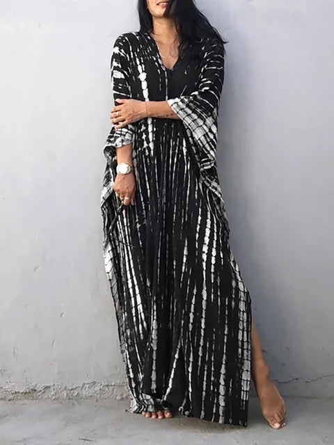 Maxi robe caftan chic pour femme, parfaite pour les vacances à la plage.