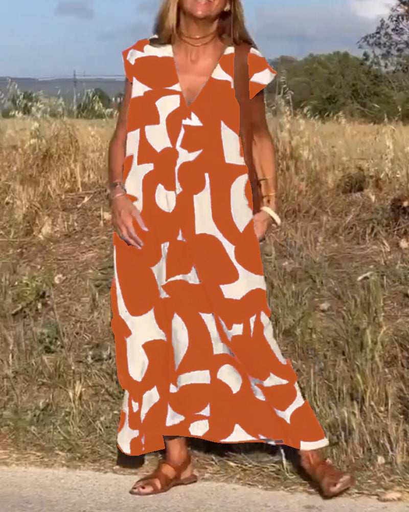 "Robe Camille élégante à imprimé moderne avec col en V flatteur, parfaite pour toutes occasions et toutes saisons."