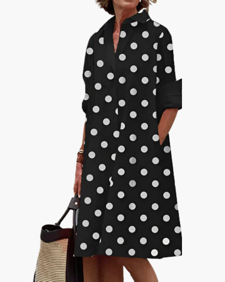 Robe chemise ample femme fluide et élégante, coupe décontractée, col classique, tissu léger, look chic et confortable.