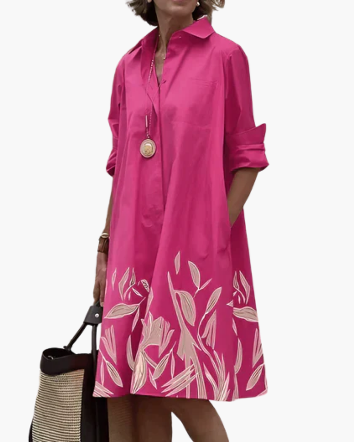 Robe chemise ample femme fluide et élégante, coupe décontractée, col classique, tissu léger, look chic et confortable.