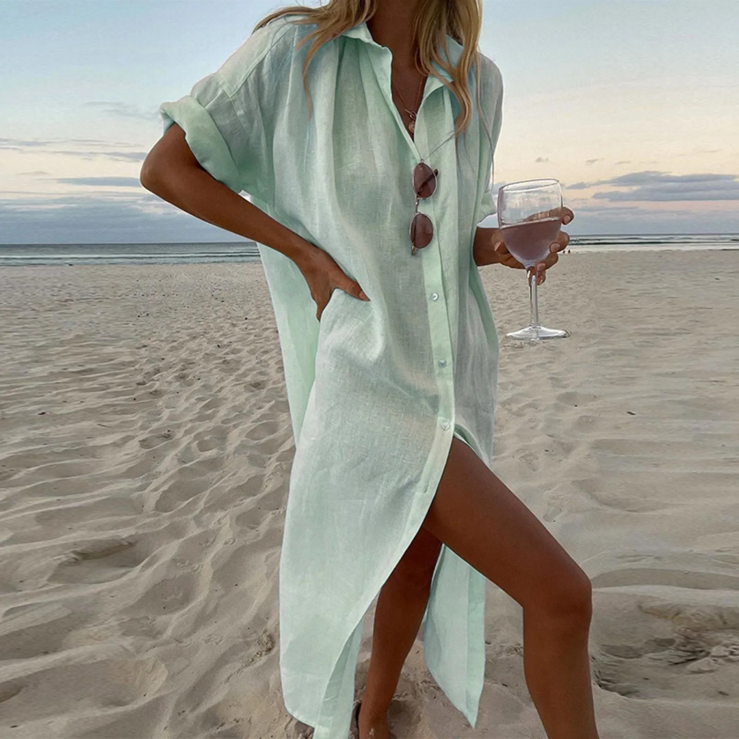 "Robe chemise élégante avec fentes hautes, boutons raffinés, look moderne, chic pour femme."