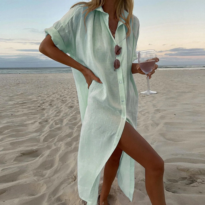 "Robe chemise élégante avec fentes hautes, boutons raffinés, look moderne, chic pour femme."