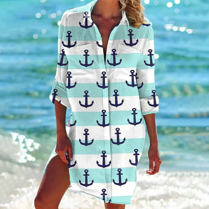Robe chemise élégante, coupe flatteuse, confort absolu.  Parfait pour le bureau ou les sorties décontractées.