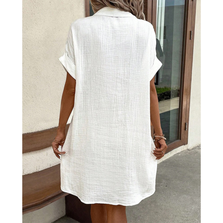 Robe chemise élégante et fluide pour l'été, taille marquée, tissu léger, idéale pour le bureau ou sorties décontractées.