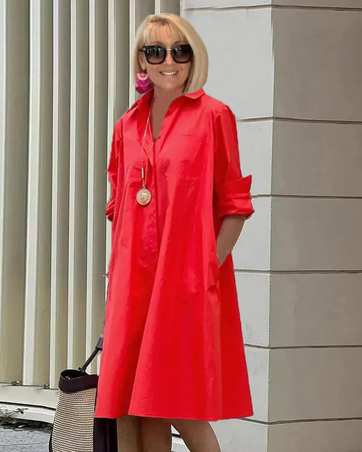 "Robe chemise élégante pour femme, ligne fluide, touche raffinée, vue de face, en blanc, bleu, noir, orange, rouge."