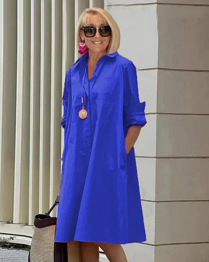 "Robe chemise élégante pour femme, ligne fluide, touche raffinée, vue de face, en blanc, bleu, noir, orange, rouge."