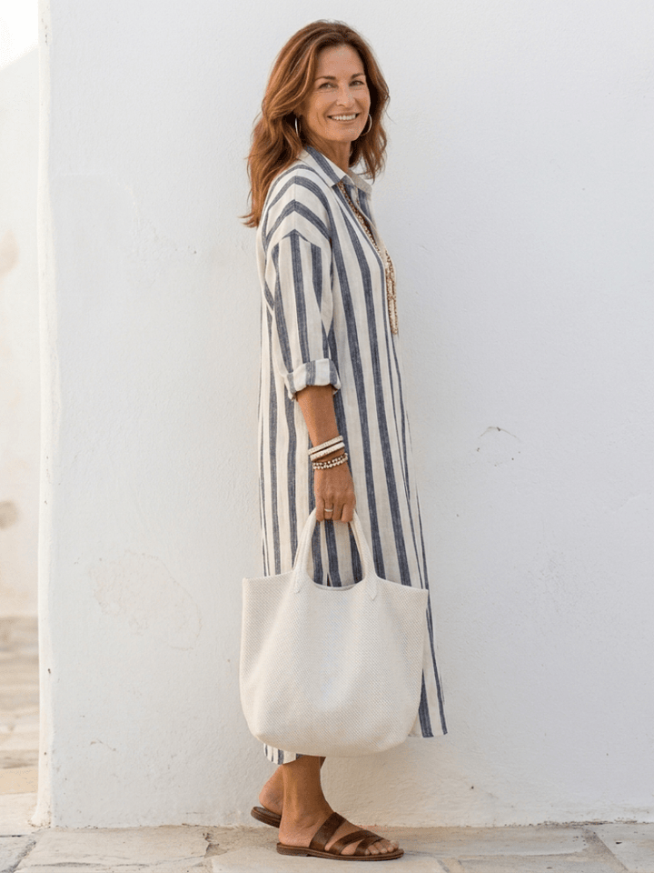 Robe longue femme à rayures, décontractée et chic, coupe ample et pratique avec ses poches.