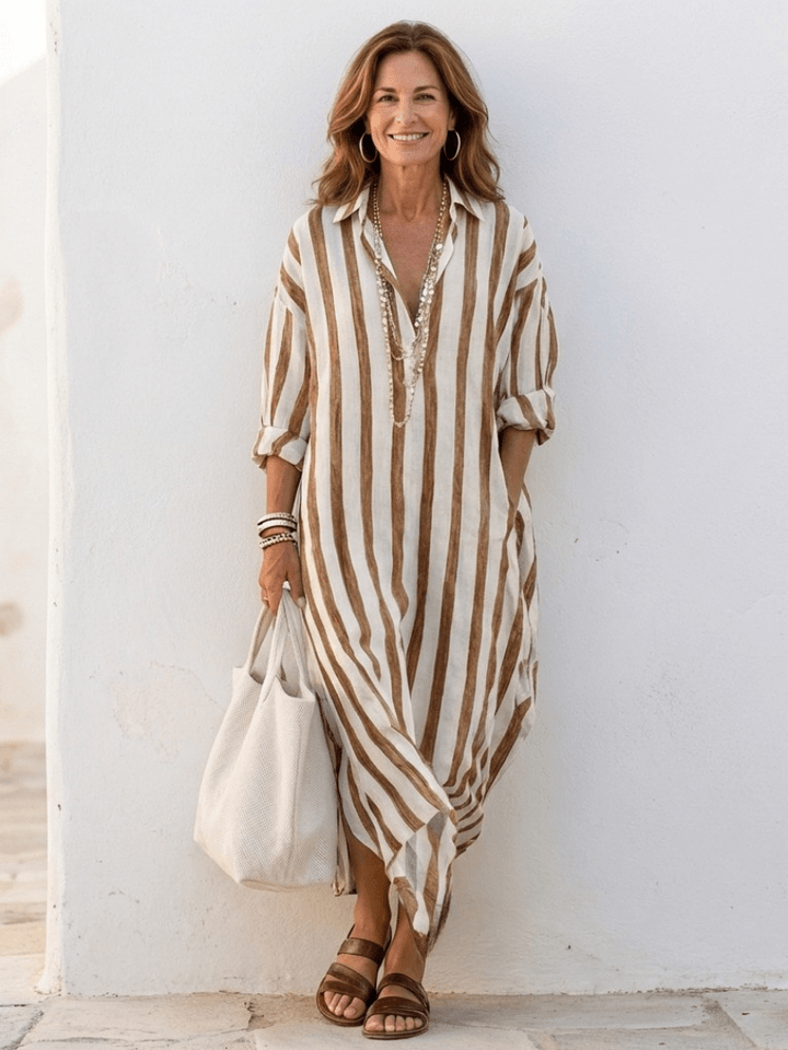 Vêtement femme été: robe midi rayée, style chemise ample, idéal pour un look confortable et élégant.