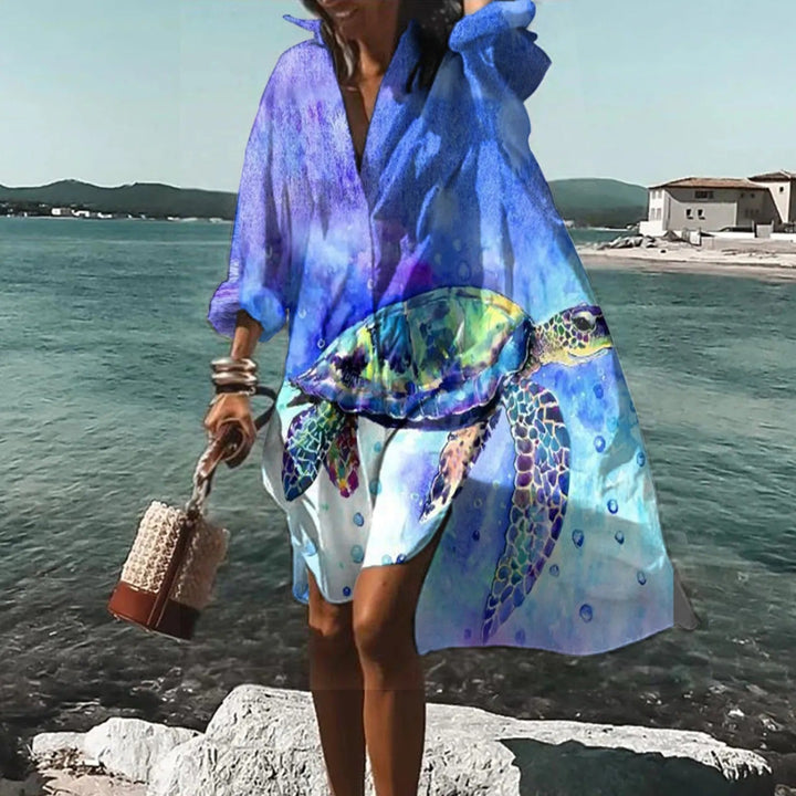 Robe chemise midi femme décontractée, coupe droite et légère, parfaite pour un été confortable.
