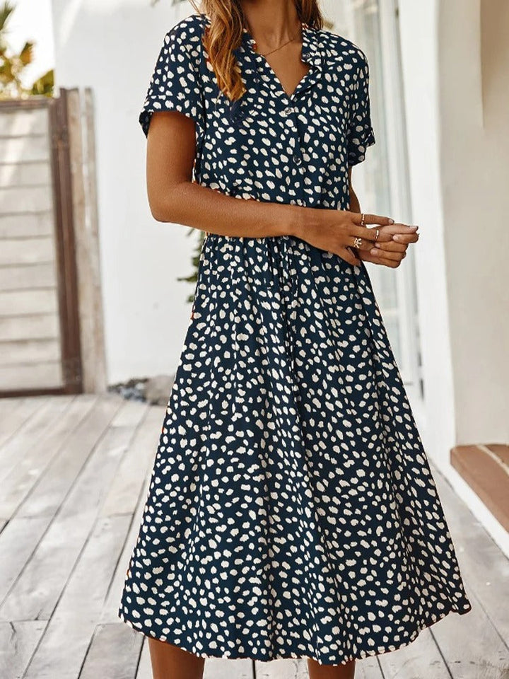 Robe chemise midi élégante et confortable. Coupe fluide, idéale pour toutes occasions.